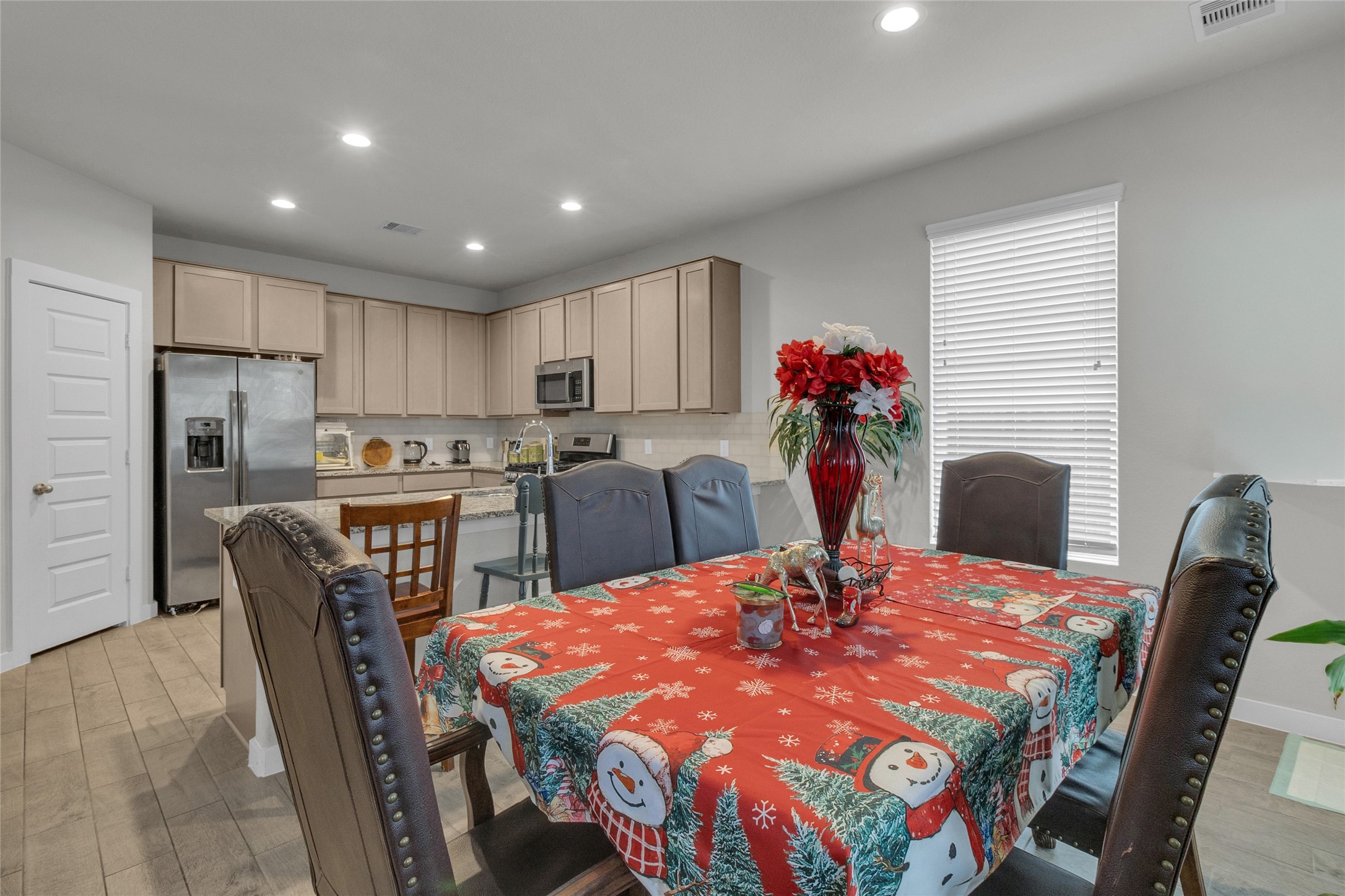 2314 Village Side Trail Rosenberg, TX 77471 - Photo 12 of 31 a dining room with furniture and window