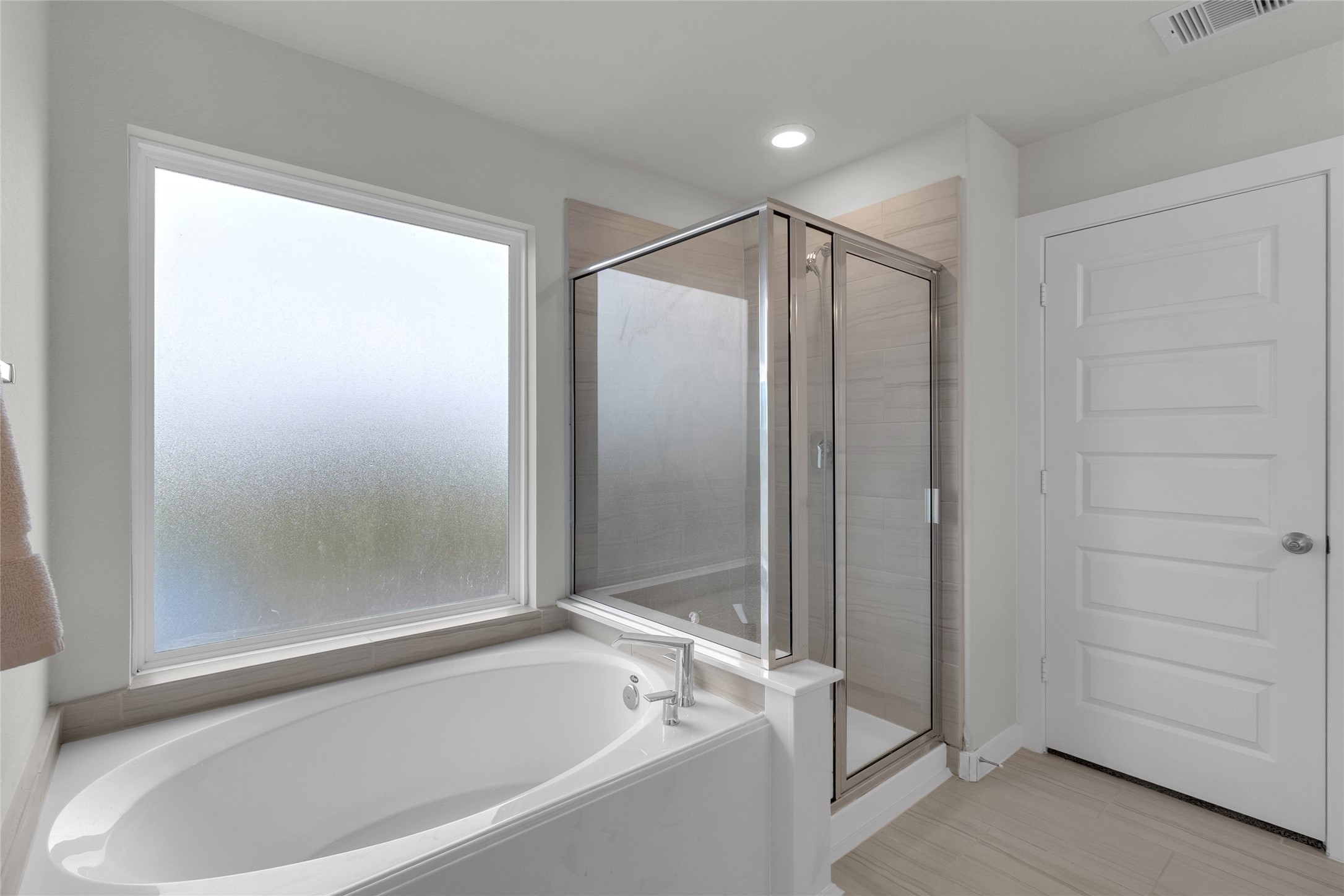 2314 Village Side Trail Rosenberg, TX 77471 - Photo 21 of 31 a bathroom with a bathtub and a shower