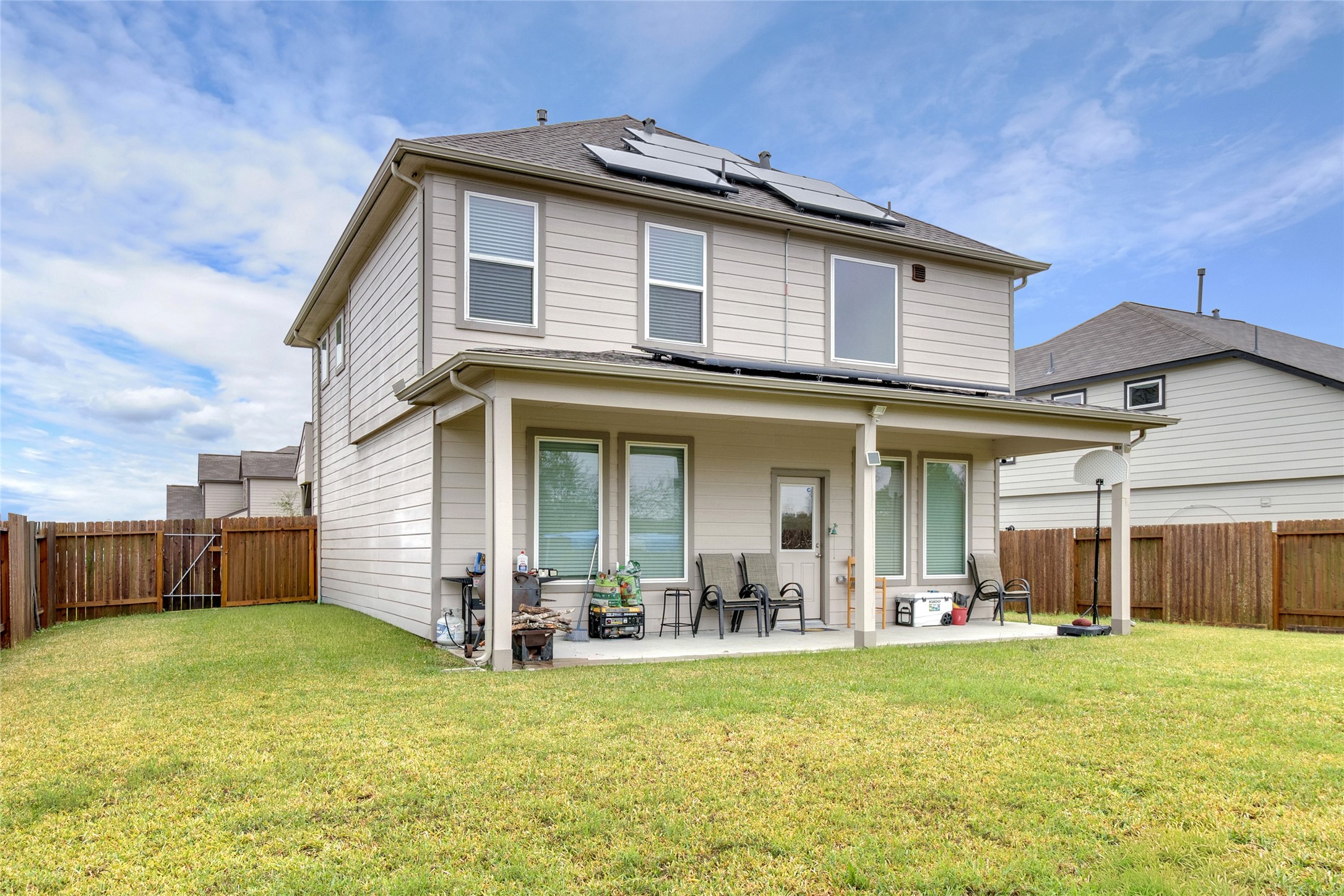 2314 Village Side Trail Rosenberg, TX 77471 - Photo 30 of 31 a backyard of a house with table and chairs