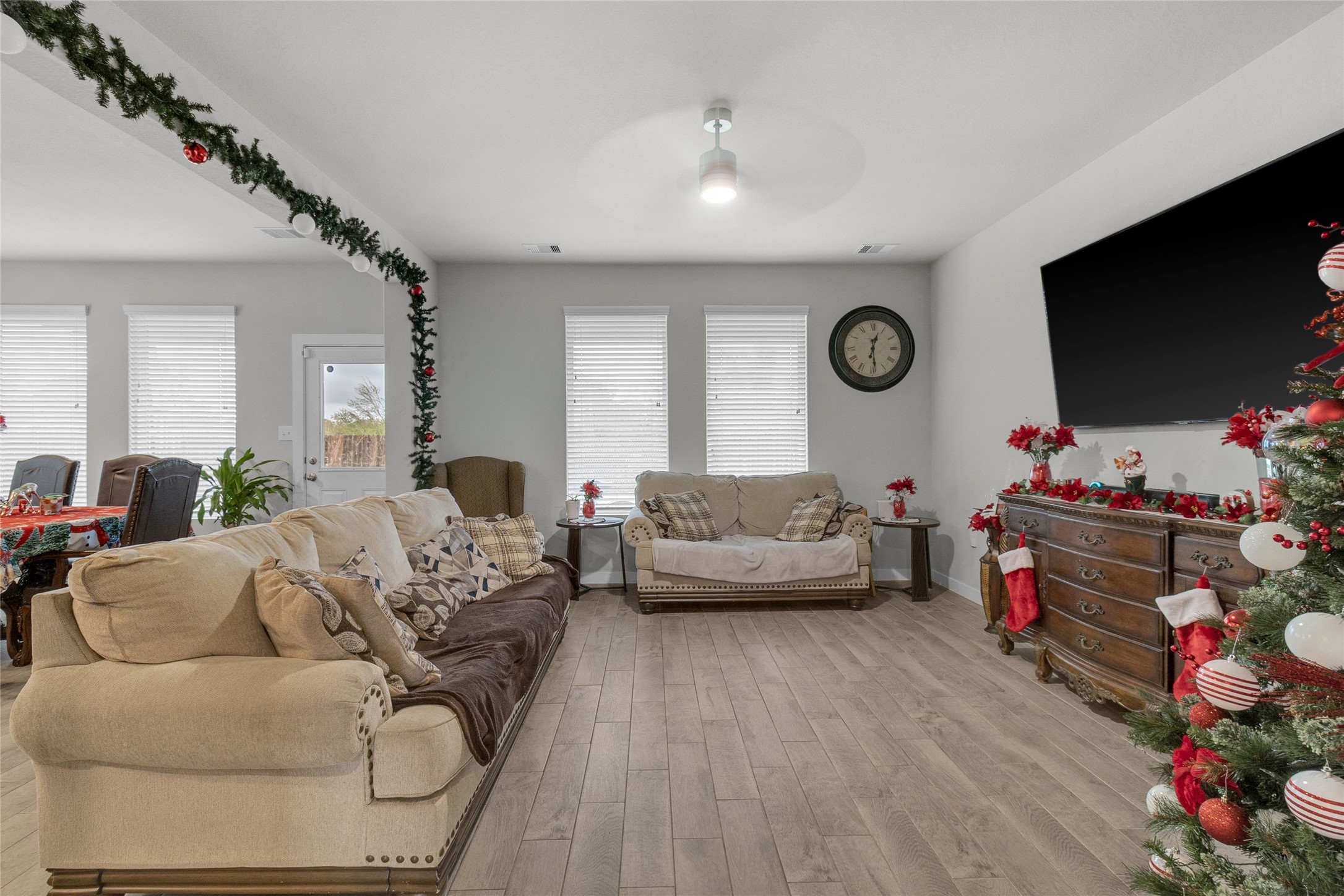 2314 Village Side Trail Rosenberg, TX 77471 - Photo 4 of 31 a living room with furniture and a flat screen tv