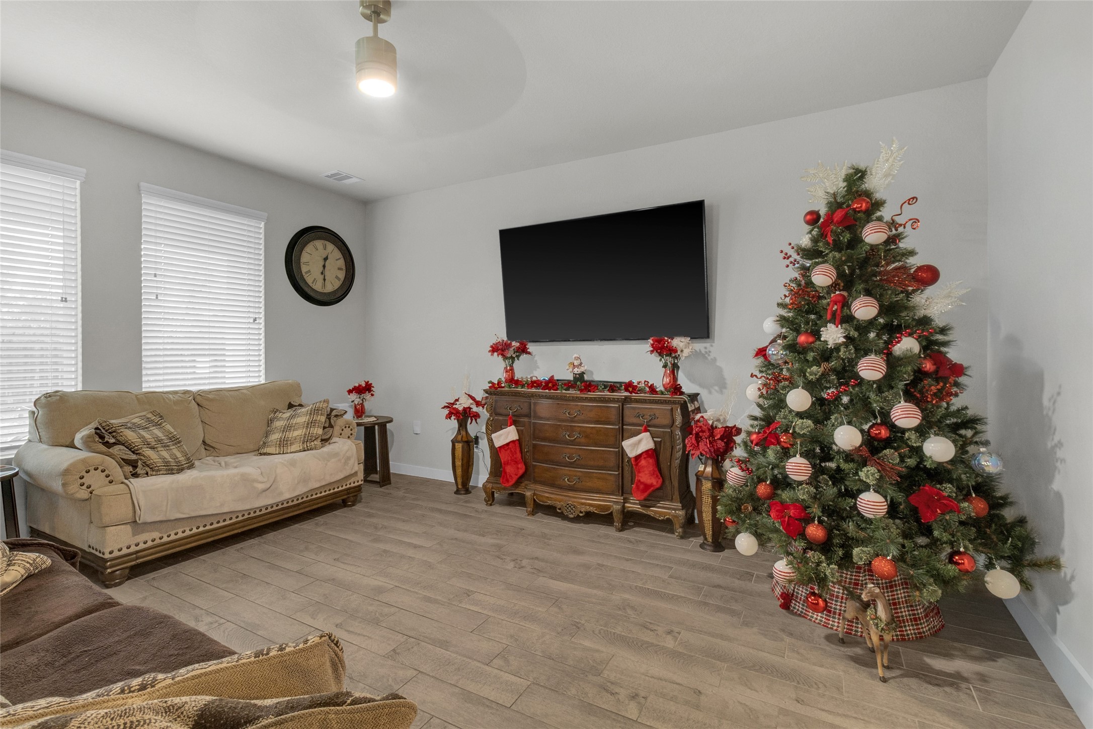 2314 Village Side Trail Rosenberg, TX 77471 - Photo 5 of 31 a living room with furniture and a flat screen tv