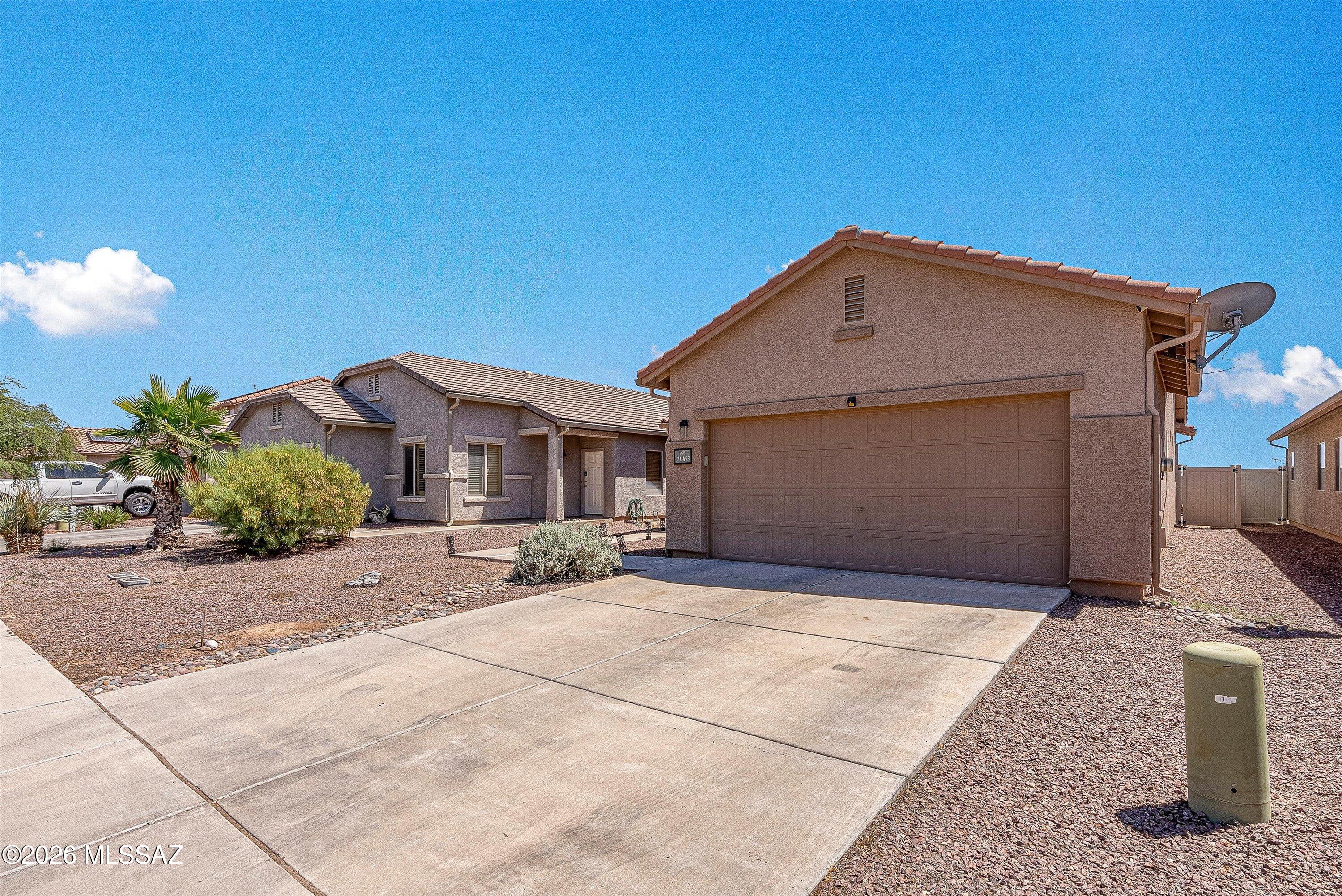 21163 East Treasure Road Red Rock, AZ 85145 - Photo 4 of 35 a view of a house with backyard