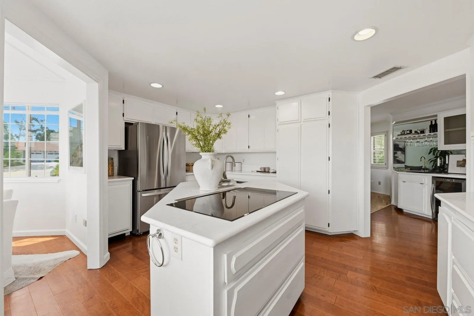 3132 Don Rolando Escondido, CA 92025 - Photo 14 of 56 a kitchen with a sink and refrigerator