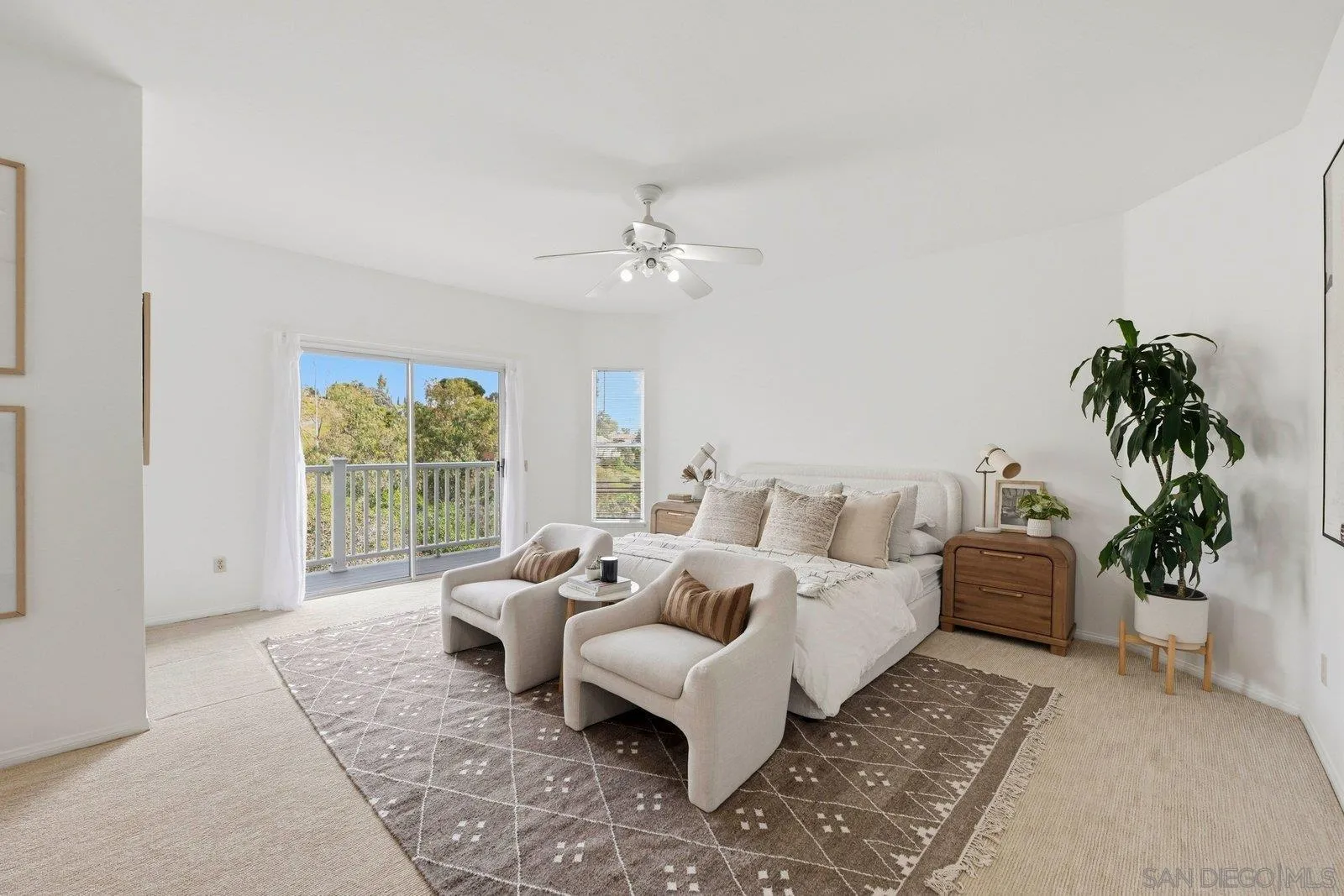3132 Don Rolando Escondido, CA 92025 - Photo 19 of 56 a living room with furniture and a large window