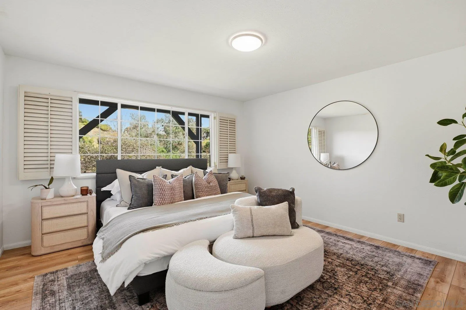 3132 Don Rolando Escondido, CA 92025 - Photo 28 of 56 a bedroom with a large bed and a window