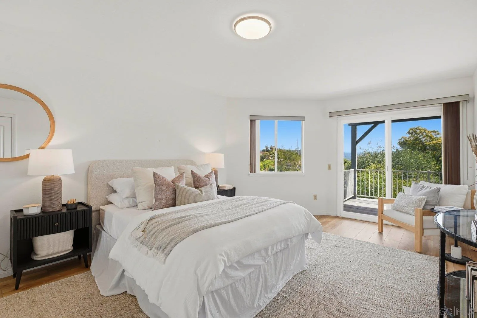 3132 Don Rolando Escondido, CA 92025 - Photo 29 of 56 a bedroom with a bed and a large window