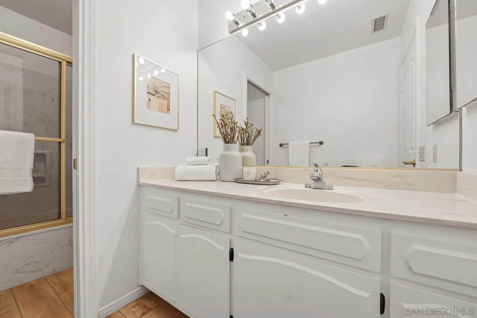 3132 Don Rolando Escondido, CA 92025 - Photo 31 of 56 a bathroom with a sink and a mirror