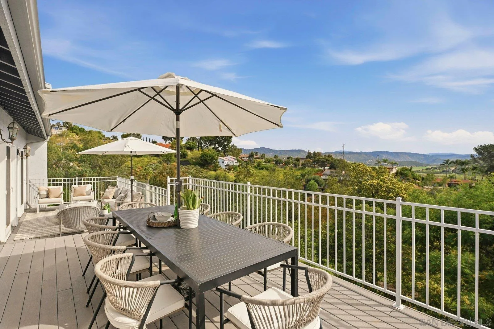 3132 Don Rolando Escondido, CA 92025 - Photo 32 of 56 a view of a balcony with chairs and a table