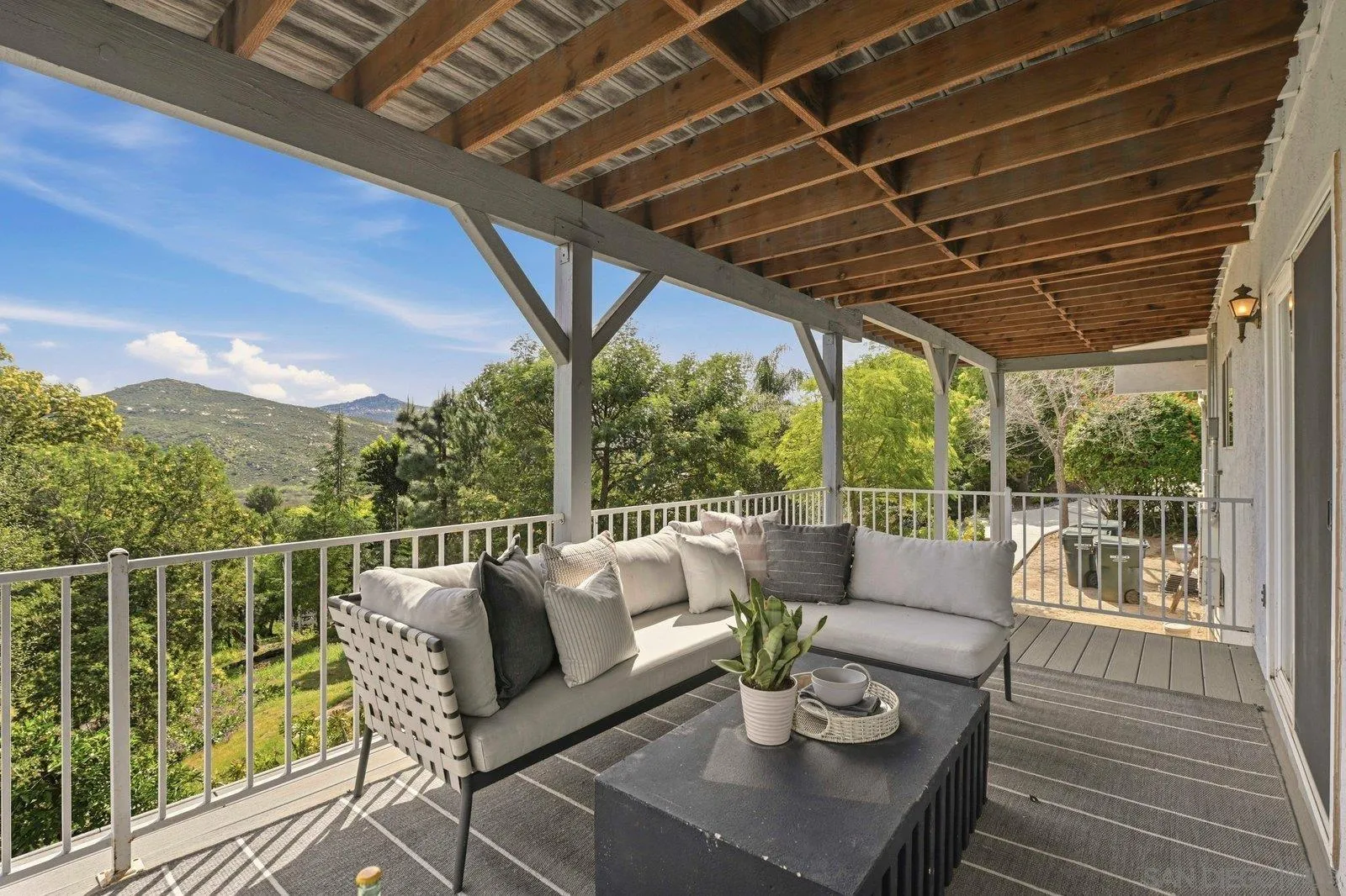 3132 Don Rolando Escondido, CA 92025 - Photo 39 of 56 a outdoor living space with furniture and wooden floor
