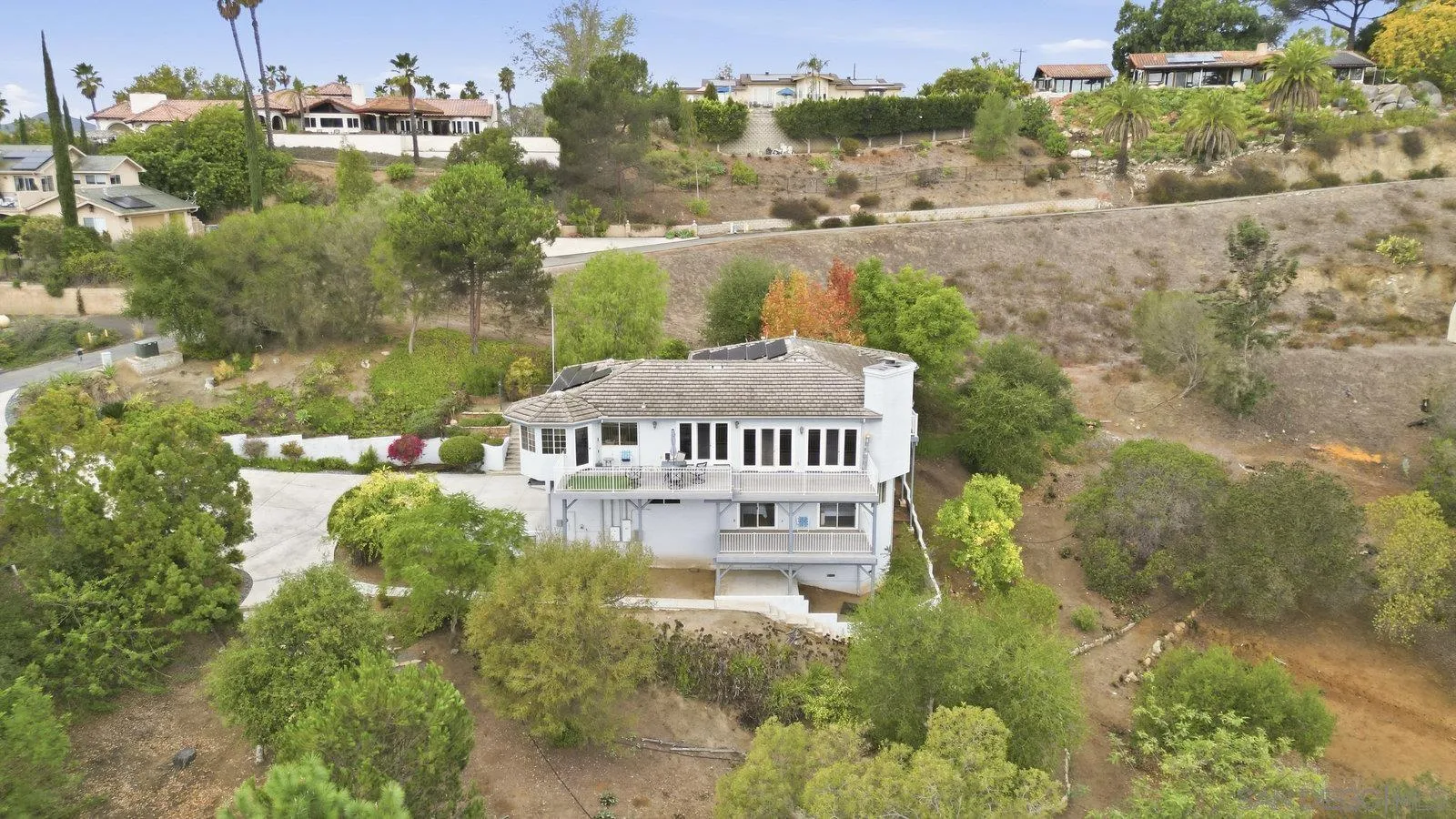 3132 Don Rolando Escondido, CA 92025 - Photo 49 of 56 a view of a house with a yard and lake view