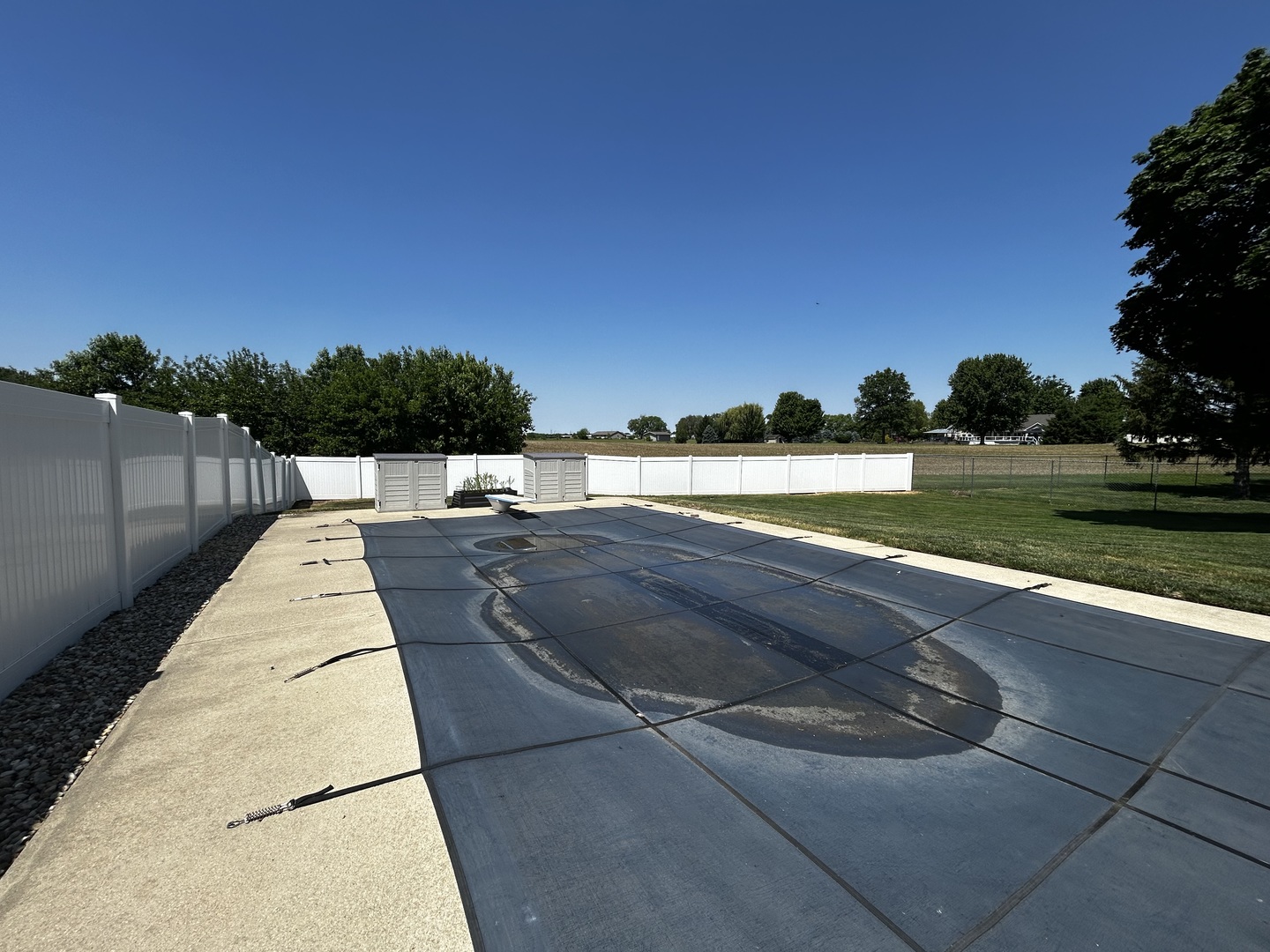 12795 Lawrence Road Sterling, IL 61081 - Photo 7 of 42 a view of swimming pool with lake view