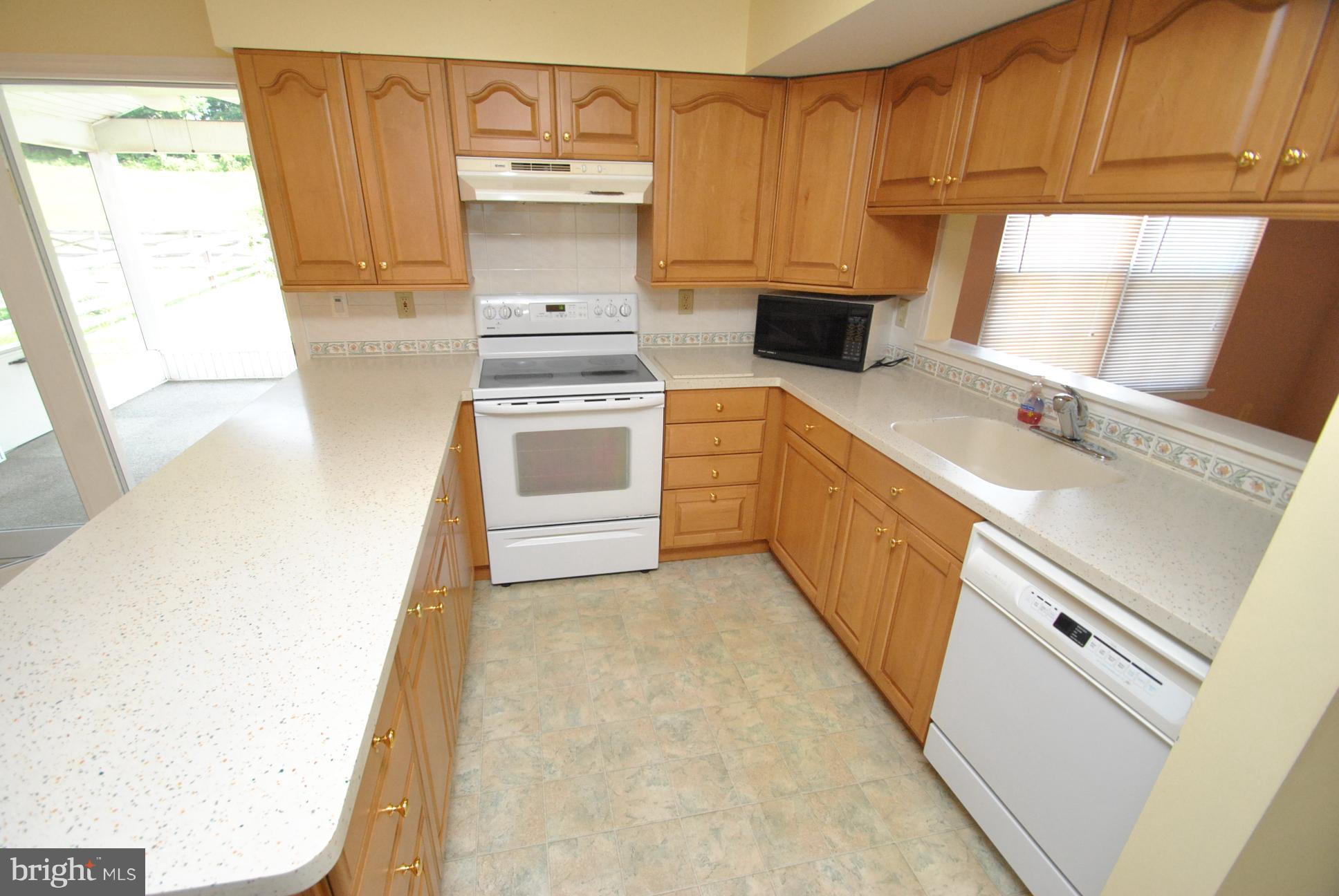 8617 Heathermill Road Baltimore, MD 21236 - Photo 7 of 20 UPDATED KITCHEN WITH CUSTOM BUILT IN BISTRO AREA