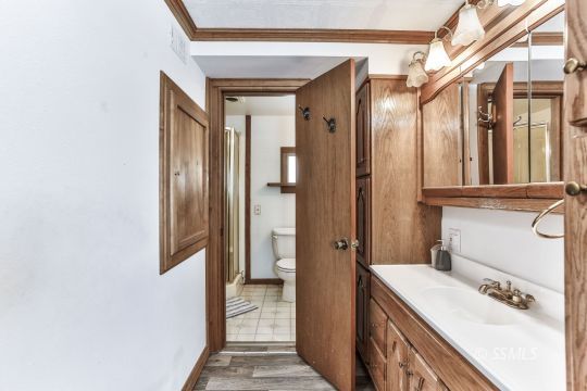 541 South Allen Street Ridgecrest, CA 93555 - Photo 33 of 41 a bathroom with a sink and a mirror