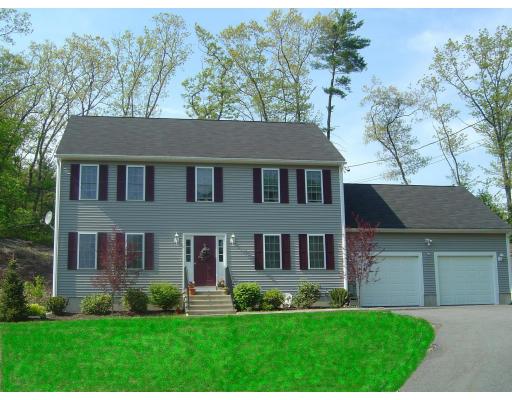 3 Ayer Road Littleton, MA 01460 - Photo 1 of 24 front view of a house with a yard