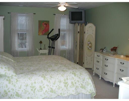 3 Ayer Road Littleton, MA 01460 - Photo 16 of 24 a bedroom with a bed dresser and a window