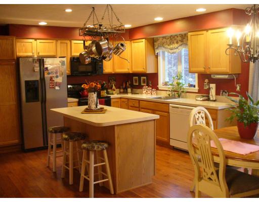 3 Ayer Road Littleton, MA 01460 - Photo 2 of 24 a kitchen with a sink and cabinets