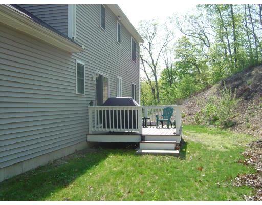 3 Ayer Road Littleton, MA 01460 - Photo 23 of 24 a view of a chair in the backyard