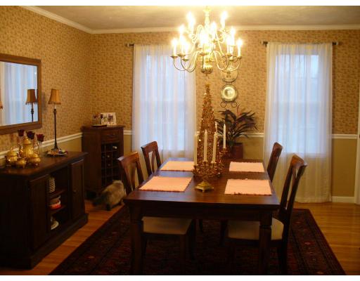 3 Ayer Road Littleton, MA 01460 - Photo 3 of 24 a view of a dining room with furniture and chandelier