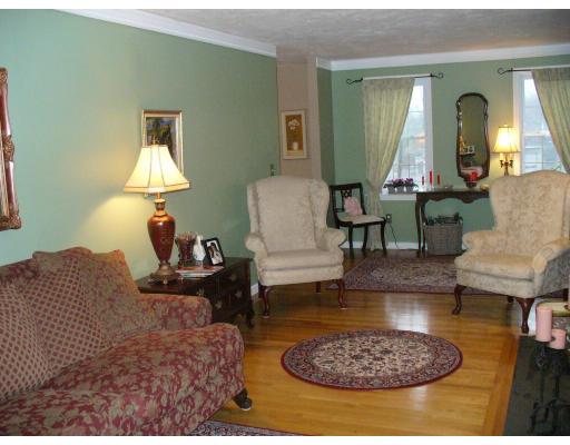 3 Ayer Road Littleton, MA 01460 - Photo 5 of 24 a living room with furniture and a fireplace