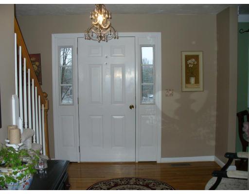 3 Ayer Road Littleton, MA 01460 - Photo 8 of 24 a view of a hallway with chandelier