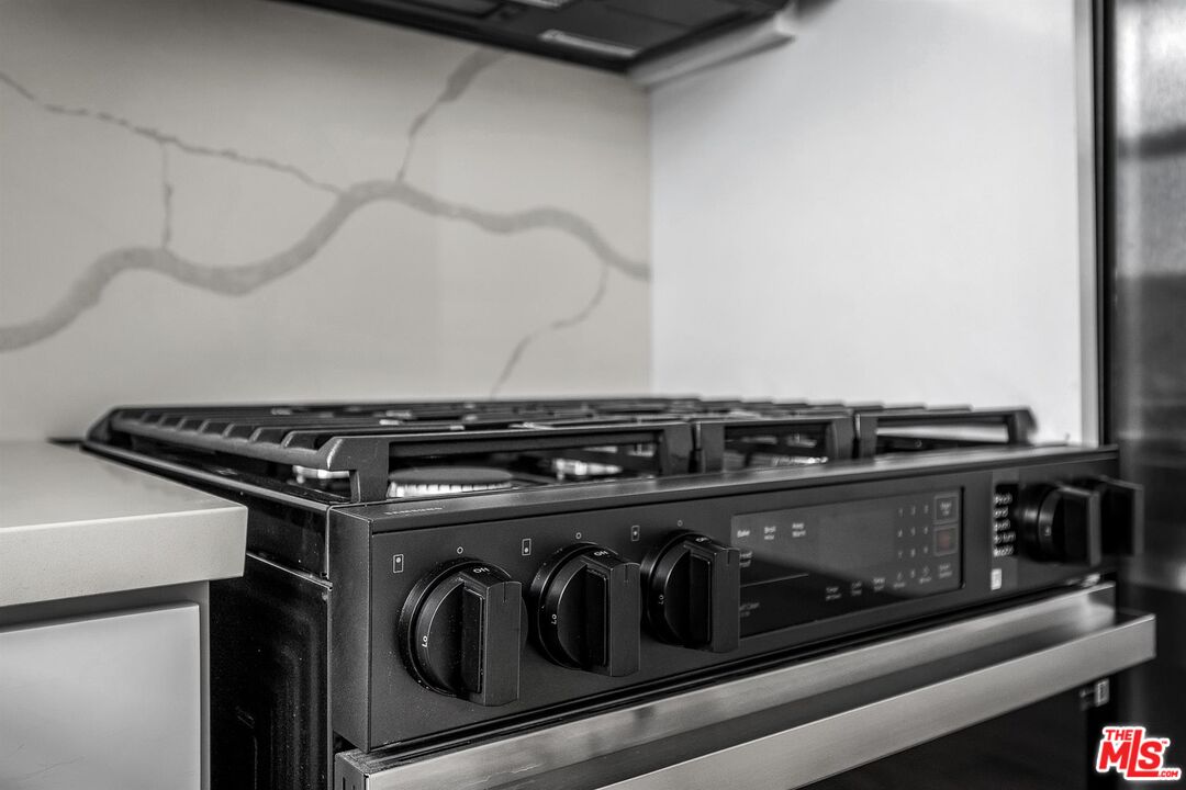 4703 Saturn Street Los Angeles, CA 90019 - Photo 29 of 37 a close view of stove top oven
