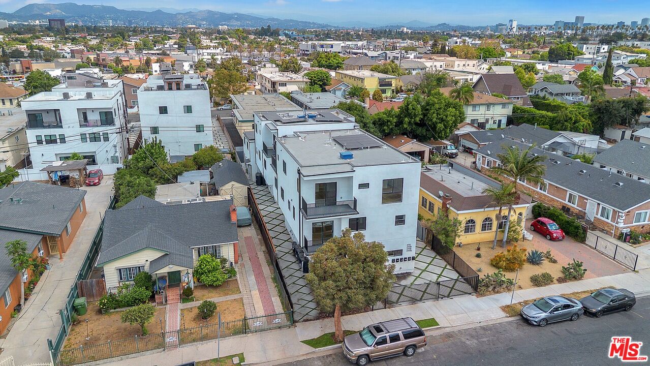 4703 Saturn Street Los Angeles, CA 90019 - Photo 35 of 37 an aerial view of residential houses with outdoor space