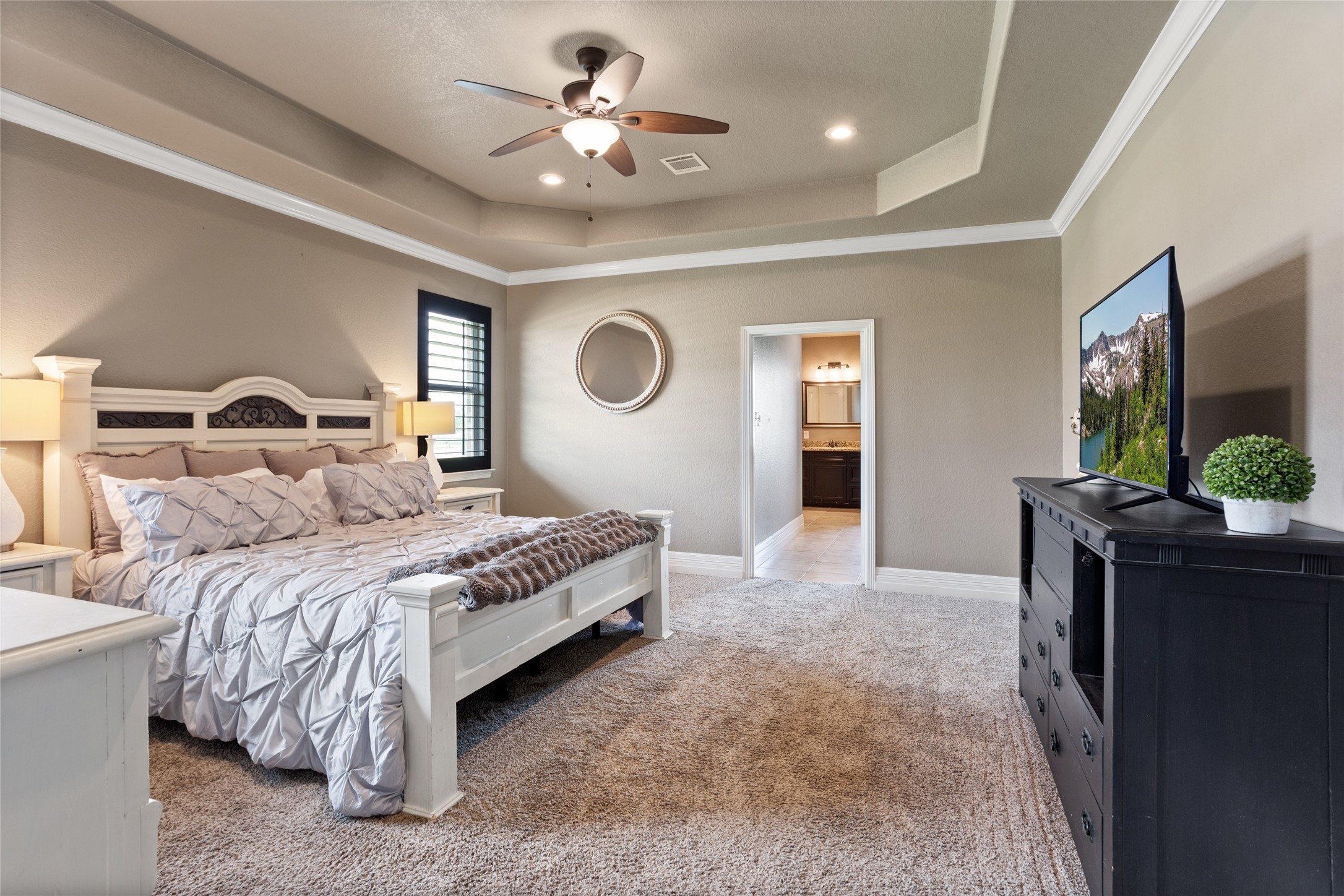 7842 Pebble Hill Lane Rosharon, TX 77583 - Photo 15 of 33 a bedroom with a bed and a flat screen tv