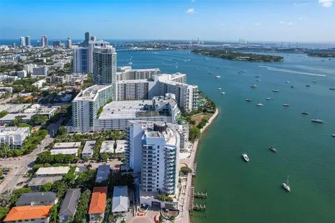 a view of a lake from a balcony