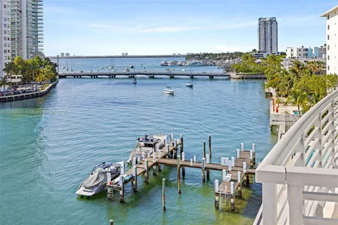 a spacious bathroom with a tub and shower