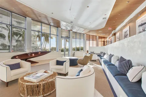 a very nice looking living room with a large window