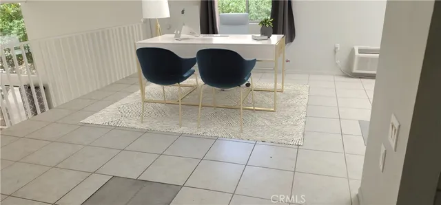 a view of a bathroom with a sink and a mirror