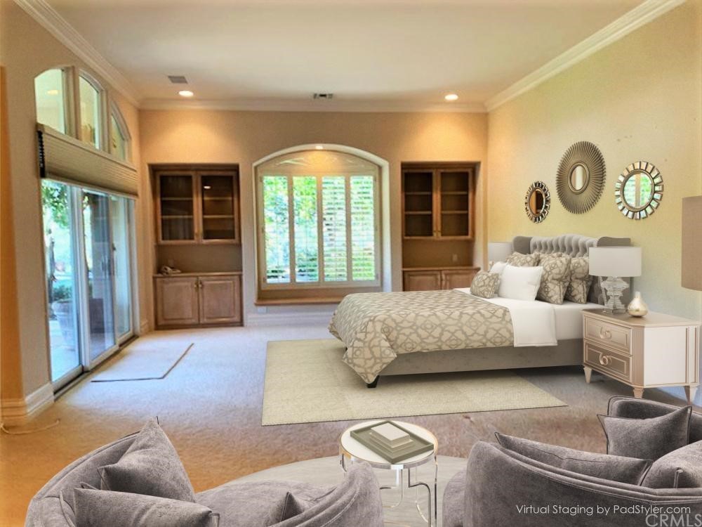 3930 Coral Place Calabasas, CA 91302 - Photo 16 of 50 a bedroom with a large bed couch and windows