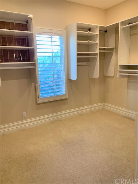 3930 Coral Place Calabasas, CA 91302 - Photo 21 of 50 view of empty room with cabinet and window