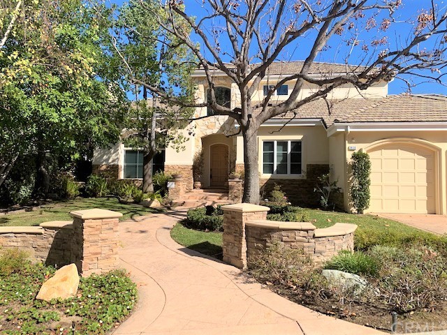 3930 Coral Place Calabasas, CA 91302 - Photo 4 of 50 a view of a house with backyard and sitting area