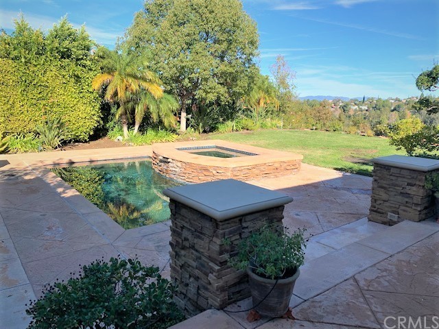 3930 Coral Place Calabasas, CA 91302 - Photo 42 of 50 a view of a backyard with plants