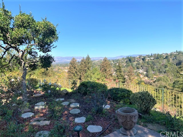 3930 Coral Place Calabasas, CA 91302 - Photo 43 of 50 a view of a backyard with plants and a garden
