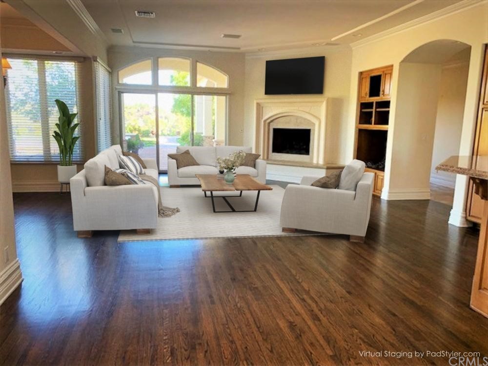 3930 Coral Place Calabasas, CA 91302 - Photo 8 of 50 a living room with furniture large window and wooden floor