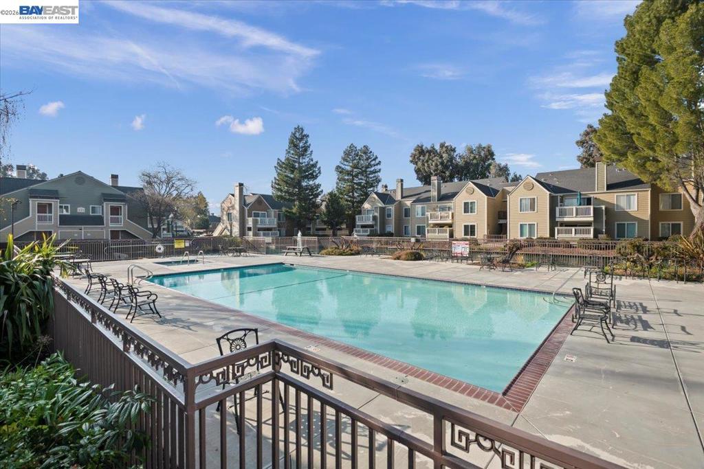 215 Reflections Drive San Ramon, CA 94583 - Photo 15 of 17 a view of a swimming pool with a patio