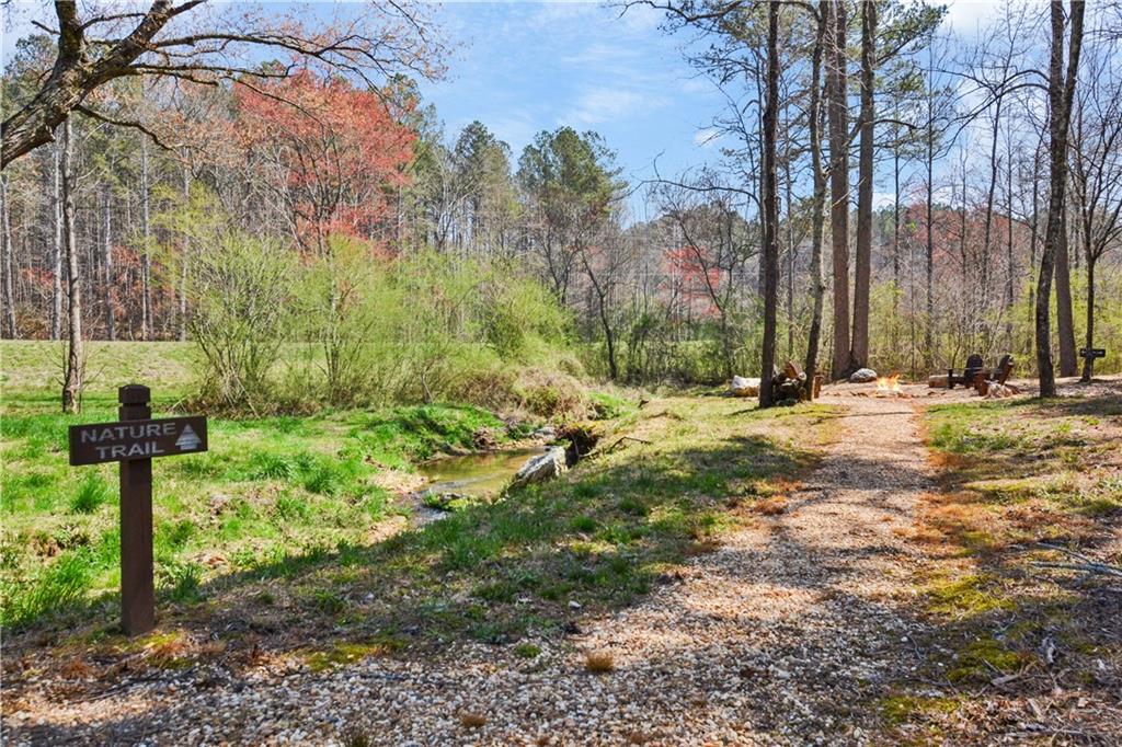 290 Anglers Ridge Road Talking Rock, GA 30175 - Photo 26 of 29 a view of a street with a house in the background