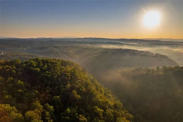 a view of lake and mountain