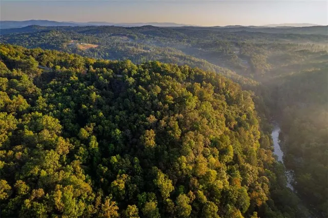a view of lake with green space