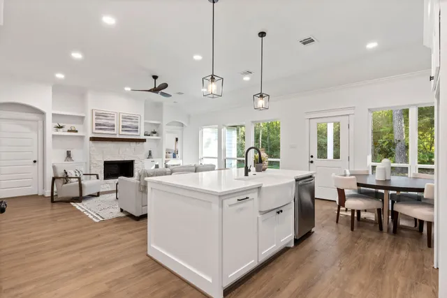 a spacious bathroom with double vanity a bathtub a shower and a sink