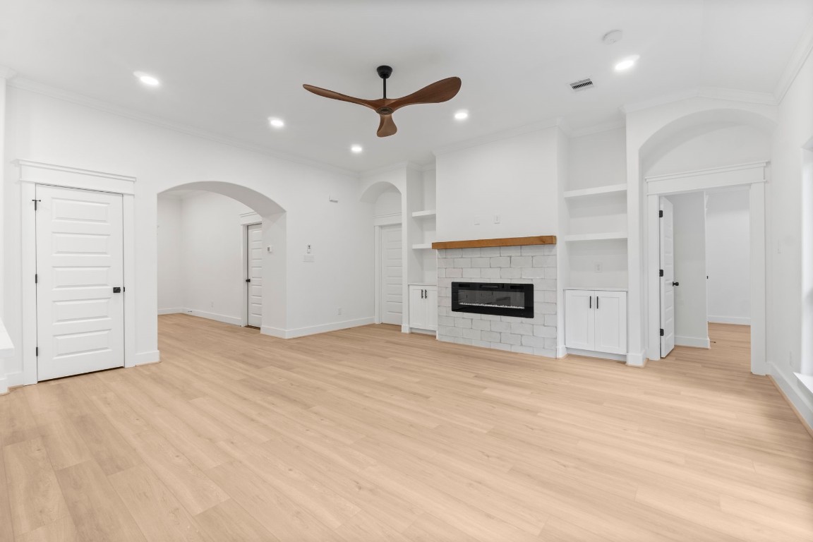 34 Cottonwood Trinity, TX 75862 - Photo 12 of 44 an empty room with closet and a fireplace