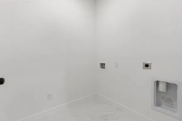 a close up of a white marble wall
