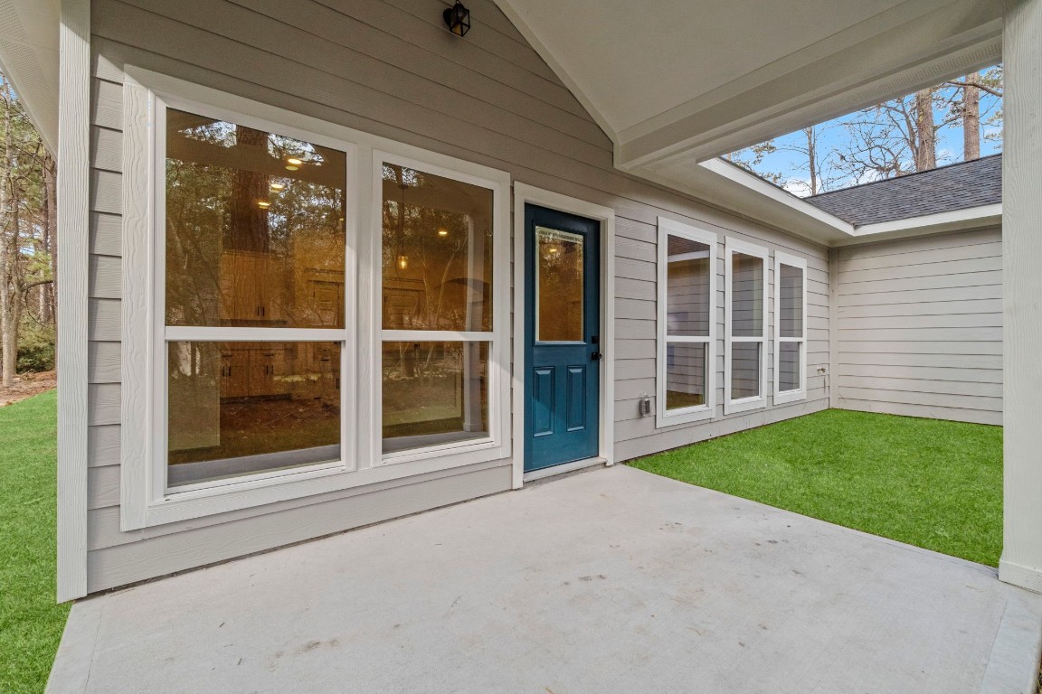 34 Cottonwood Trinity, TX 75862 - Photo 29 of 44 a view of a house with a garden
