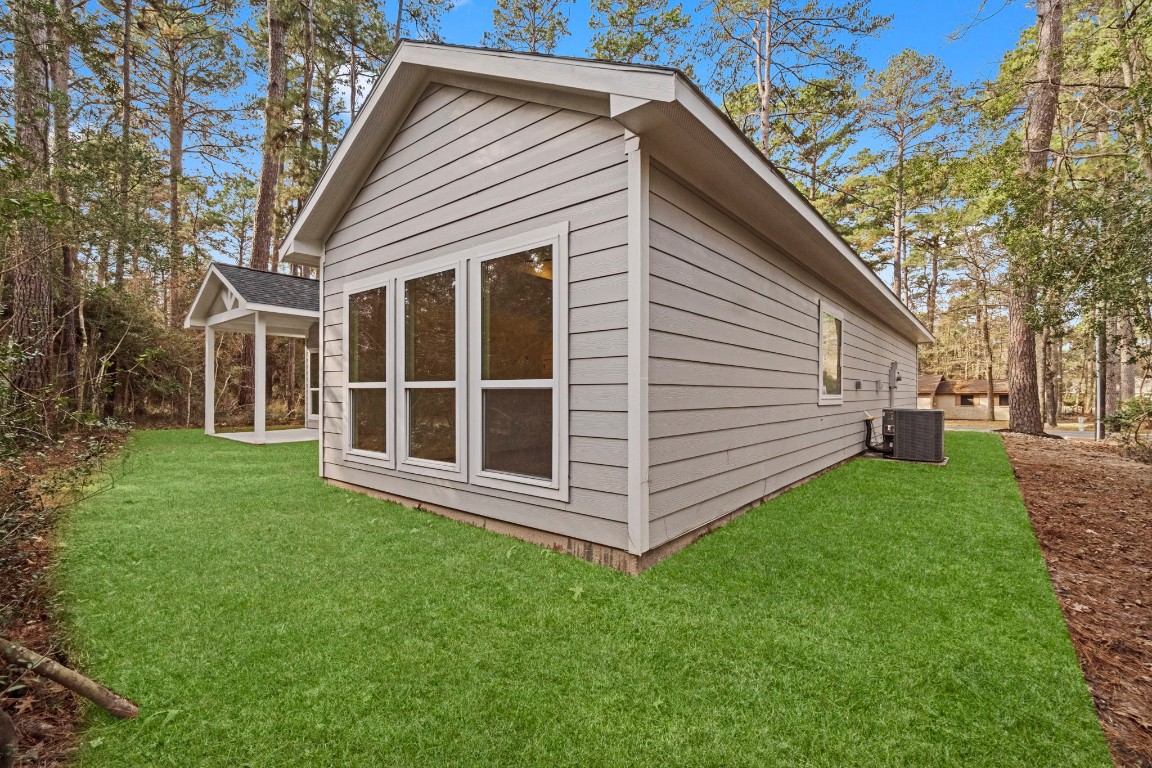 34 Cottonwood Trinity, TX 75862 - Photo 31 of 44 a view of a house with a yard