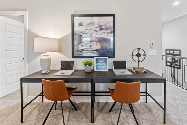 a workspace with furniture and window