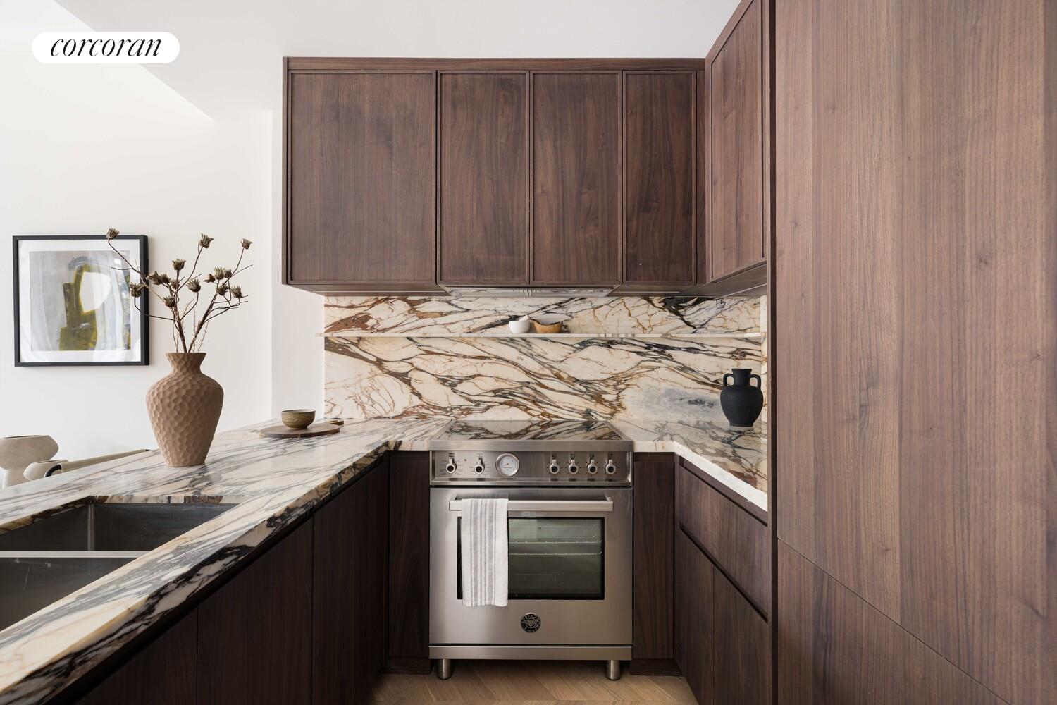 151 State Street, Unit 4 Brooklyn, NY 11201 - Photo 3 of 6 a kitchen with granite countertop a sink and a stove