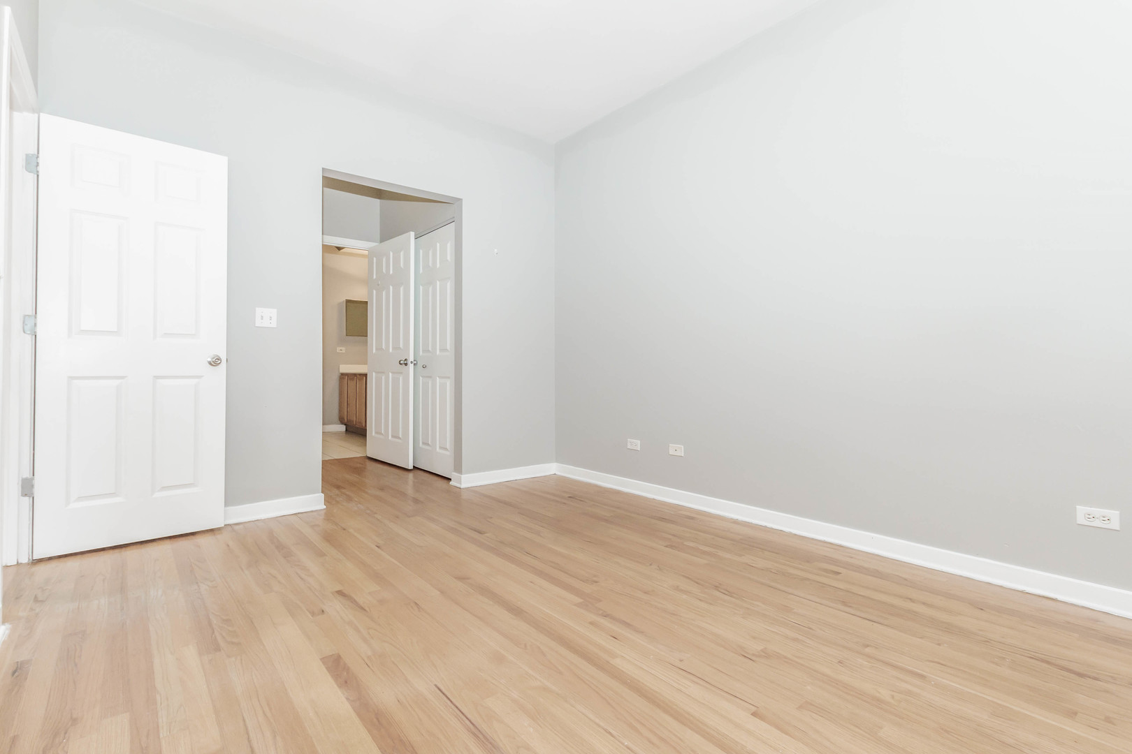 1443 West Fillmore Street Chicago, IL 60607 - Photo 11 of 37 a view of an empty room with wooden floor