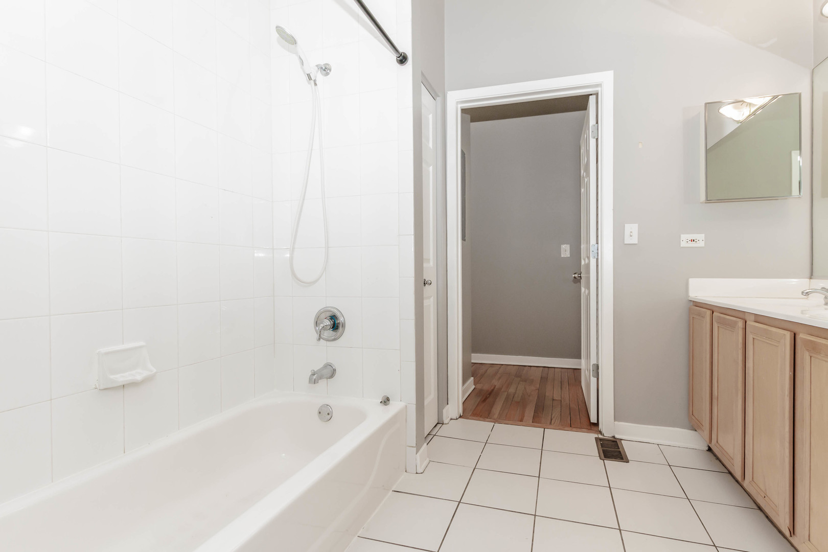 1443 West Fillmore Street Chicago, IL 60607 - Photo 15 of 37 a bathroom with a bathtub and a shower
